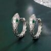Silver-toned Snake Huggie Hoop Earrings with Green "Emerald" Eyes