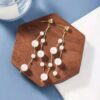 White Pearl Long Drop Earrings.