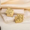 Gp 3 Dubble square stud earrings.