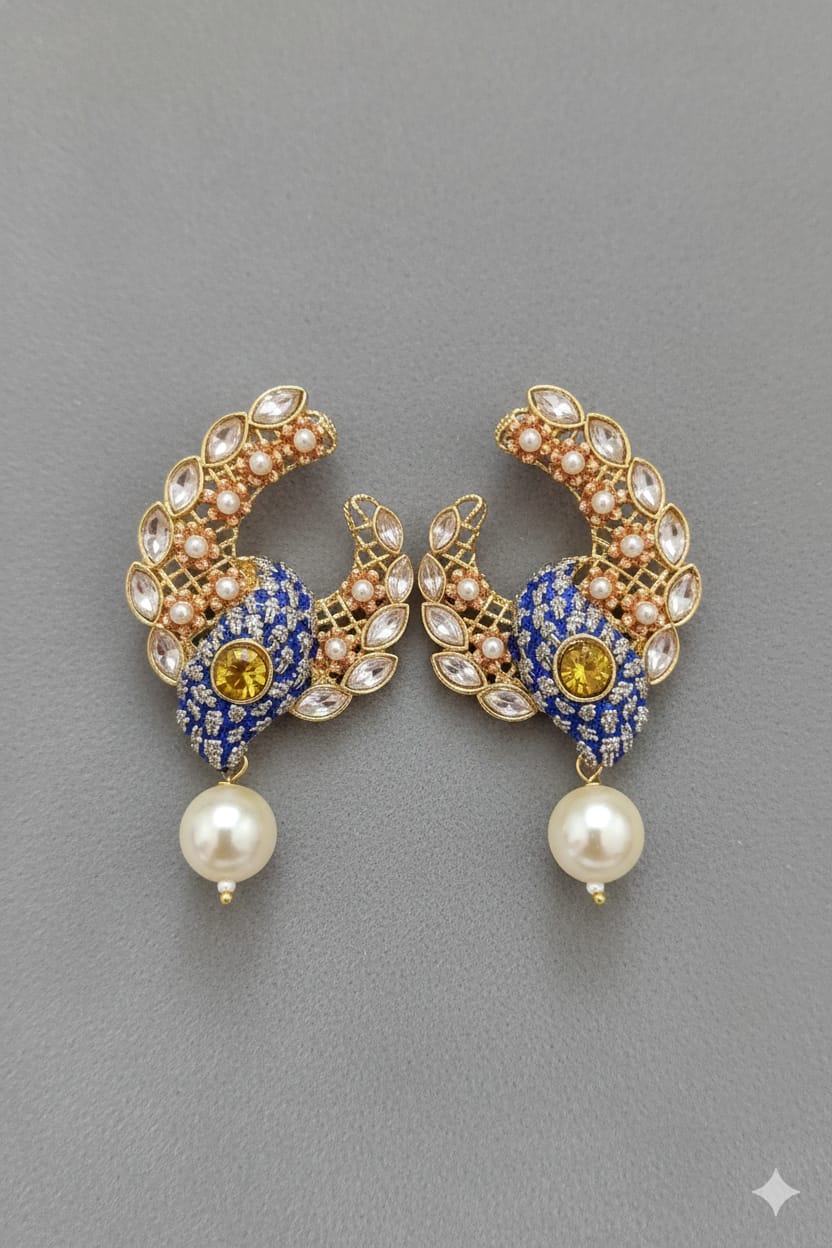 These are a pair of Indian ethnic earrings with a crescent moon design,