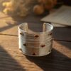 521a silver-toned multi-wire cuff bracelet