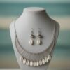529 handmade silver-tone cowrie shell necklace and earring set