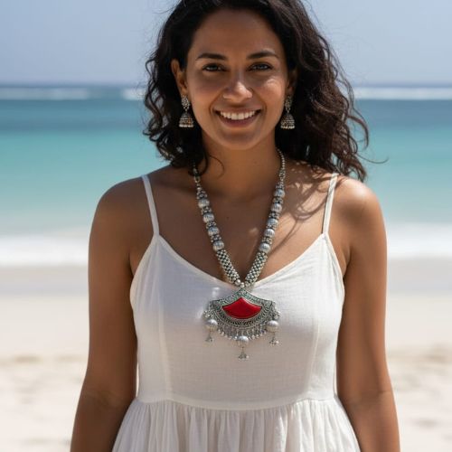 538 oxidised plated necklace set with a red stone accent.